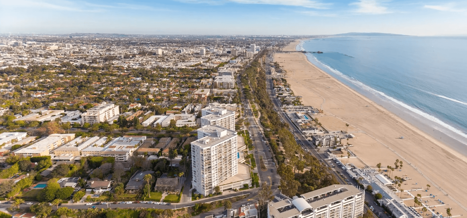 an aerial view of the beach and the city of cape town